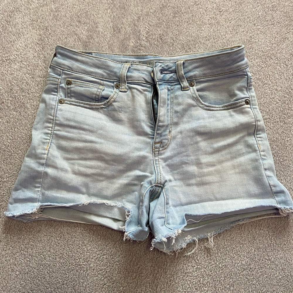 washed out blue jean shorts